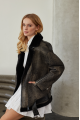 A black sheepskin coat made of natural sheepskin in the VINTAGE style