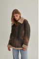 Women's sheepskin coat of brown color in vintage style