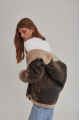 Women's sheepskin coat of brown color in vintage style