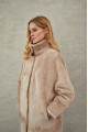 Women's long sheepskin coat made of natural sheepskin, beige color