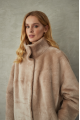 Women's long sheepskin coat made of natural sheepskin, beige color