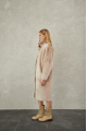 Women's long sheepskin coat made of natural sheepskin, beige color