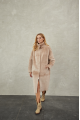 Women's long sheepskin coat made of natural sheepskin, beige color