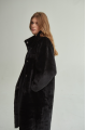 Women's long sheepskin coat made of natural sheepskin, black color