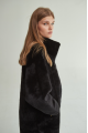 Women's long sheepskin coat made of natural sheepskin, black color