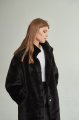 Women's long sheepskin coat made of natural sheepskin, black color