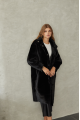 Women's long sheepskin coat made of natural sheepskin, black color