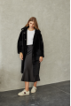 Women's long sheepskin coat made of natural sheepskin, black color