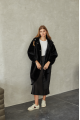 Women's long sheepskin coat made of natural sheepskin, black color