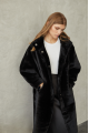 Women's long sheepskin coat made of natural sheepskin, black color