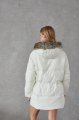 Women's down jacket of white color with a hare fur trim