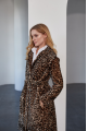 Long women's sheepskin coat made of natural sheepskin with a leopard print