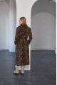 Long women's sheepskin coat made of natural sheepskin with a leopard print