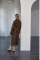 Long women's sheepskin coat made of natural sheepskin with a leopard print