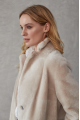 Long sheepskin coat made of natural beige color