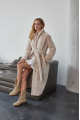 Long sheepskin coat made of natural beige color