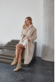 Long sheepskin coat made of natural beige color