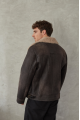 Stylish men's sheepskin coat in VINTAGE style made of natural sheepskin in dark chocolate color