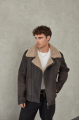 Stylish men's sheepskin coat in VINTAGE style made of natural sheepskin in dark chocolate color