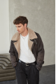 Stylish men's sheepskin coat in VINTAGE style made of natural sheepskin in dark chocolate color