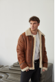 Stylish men's sheepskin coat in the VINTAGE style made of natural sheepskin, whiskey color