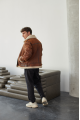 Stylish men's sheepskin coat in the VINTAGE style made of natural sheepskin, whiskey color