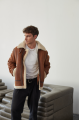 Stylish men's sheepskin coat in the VINTAGE style made of natural sheepskin, whiskey color