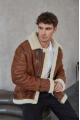 Stylish men's sheepskin coat in the VINTAGE style made of natural sheepskin, whiskey color