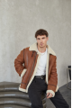 Stylish men's sheepskin coat in the VINTAGE style made of natural sheepskin, whiskey color