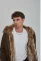 Men's parka of brown color with raccoon fur