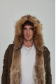 Men's parka of brown color with raccoon fur