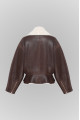 Short chocolate-colored bomber jacket made of natural sheepskin
