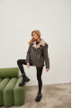 Women's sheepskin coat of gray color in vintage style