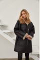 Women's sheepskin coat in VINTAGE style made of natural black sheepskin with beige fur