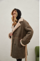 Women's sheepskin coat of gray color made of natural sheepskin in VINTAGE style