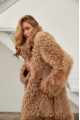 Long double-sided sheepskin coat made of natural sheepskin in brown color