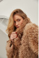 Long double-sided sheepskin coat made of natural sheepskin in brown color