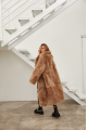 Long double-sided sheepskin coat made of natural sheepskin in brown color