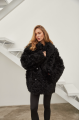 Women's double-sided sheepskin coat of black color made of natural sheepskin