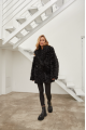 Women's double-sided sheepskin coat of black color made of natural sheepskin