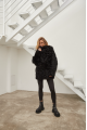 Women's double-sided sheepskin coat of black color made of natural sheepskin