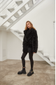 Women's double-sided sheepskin coat of black color made of natural sheepskin