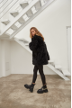 Women's double-sided sheepskin coat of black color made of natural sheepskin