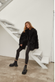 Women's double-sided sheepskin coat of black color made of natural sheepskin