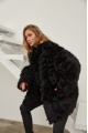 Women's double-sided sheepskin coat of black color made of natural sheepskin