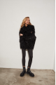 Women's double-sided sheepskin coat of black color made of natural sheepskin