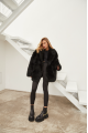 Women's two-sided sheepskin coat made of natural cashmere lamb black color