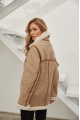 Women's sheepskin coat in VINTAGE style made of natural beige sheepskin