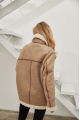 Women's sheepskin coat in VINTAGE style made of natural beige sheepskin