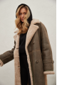 Women's sheepskin coat of gray color made of natural sheepskin in VINTAGE style